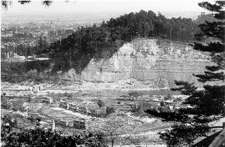 The cliff in 1954. Notice houses near river.