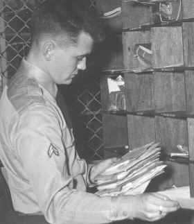 Abraham sorting mail at IX Corps Headquarters. Story about it later appeared in Chicago newspaper.